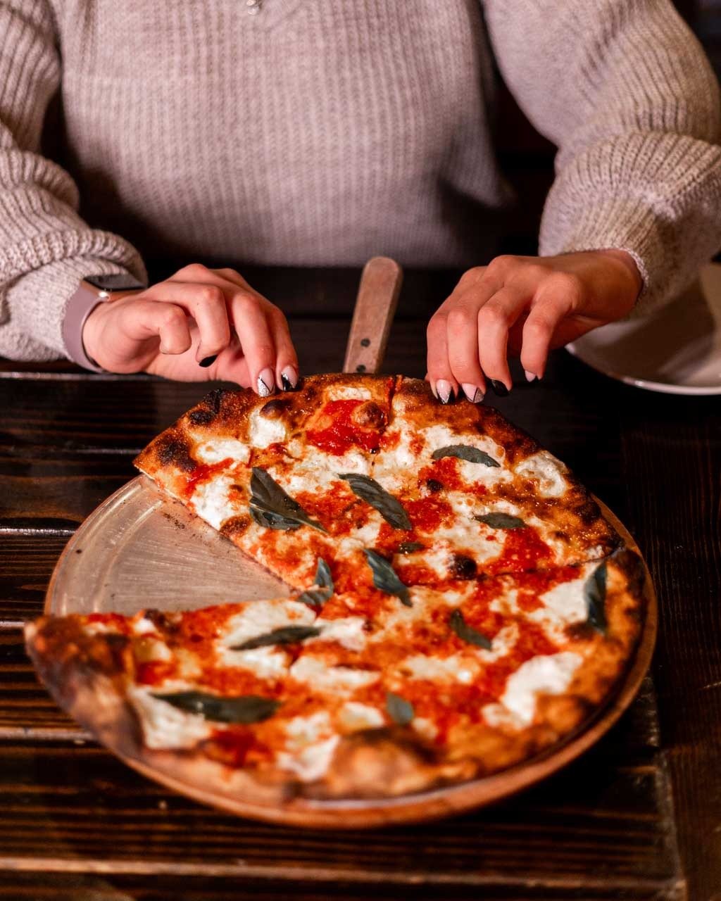 Coal-fired margherita pizza fresh from the oven