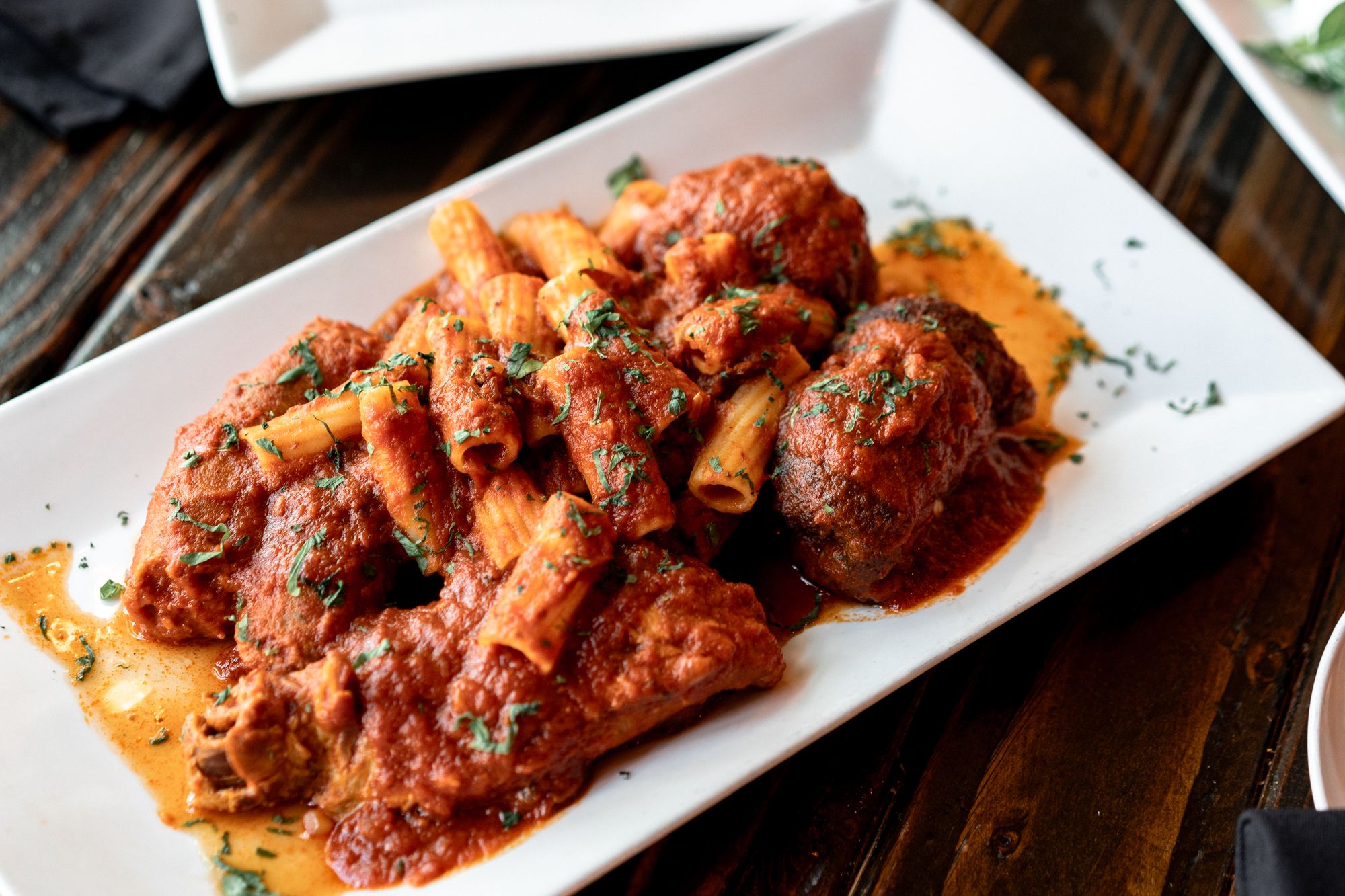 A shared table of Via Sposito's scratch-made Italian dishes